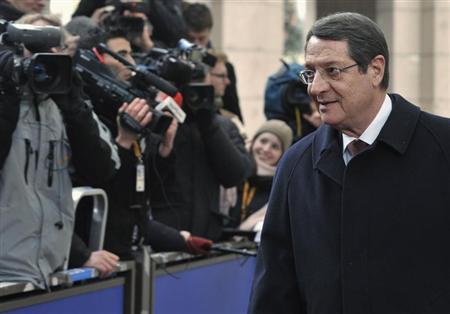 Cyprus president says depositors had to pay to avoid bankruptcy